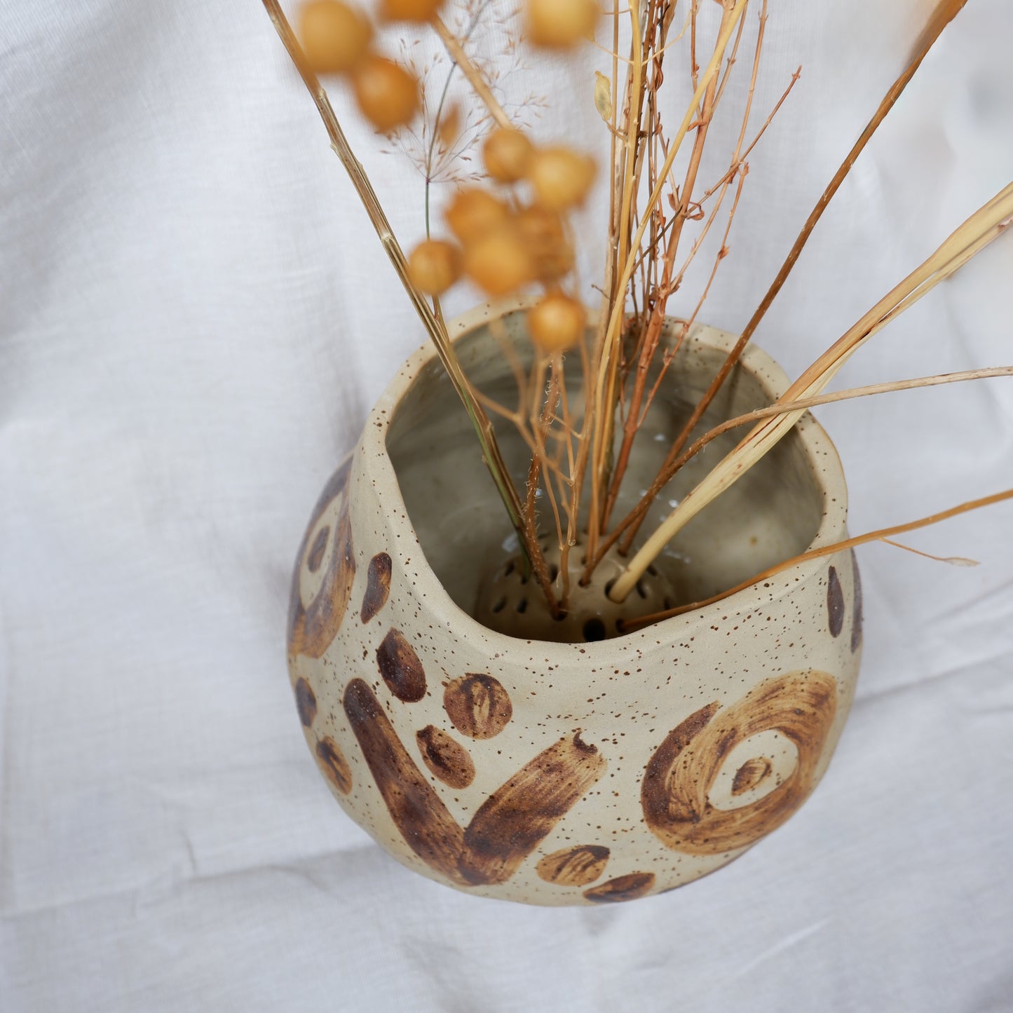 Vase decorated with wild clay