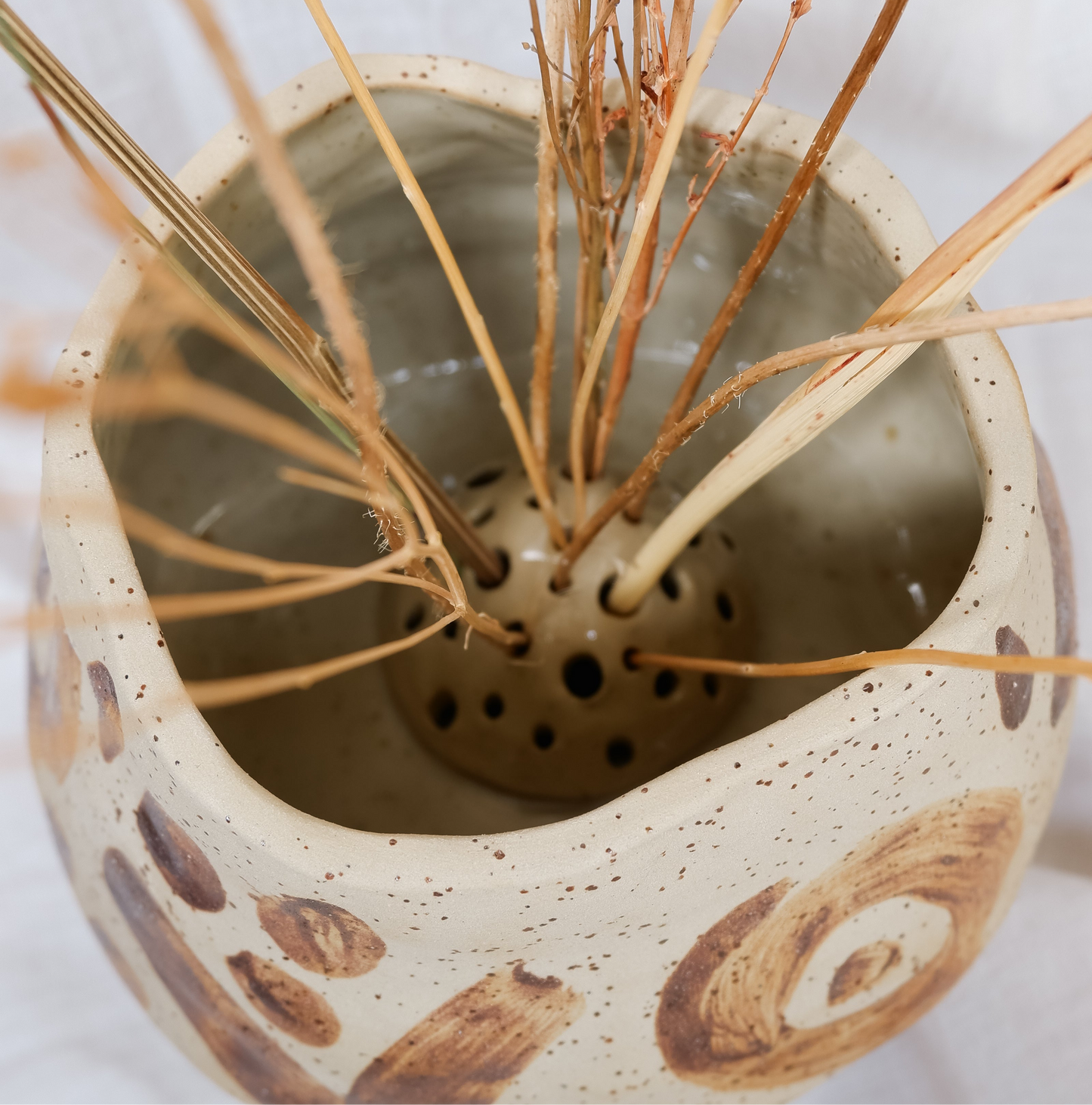 Vase decorated with wild clay