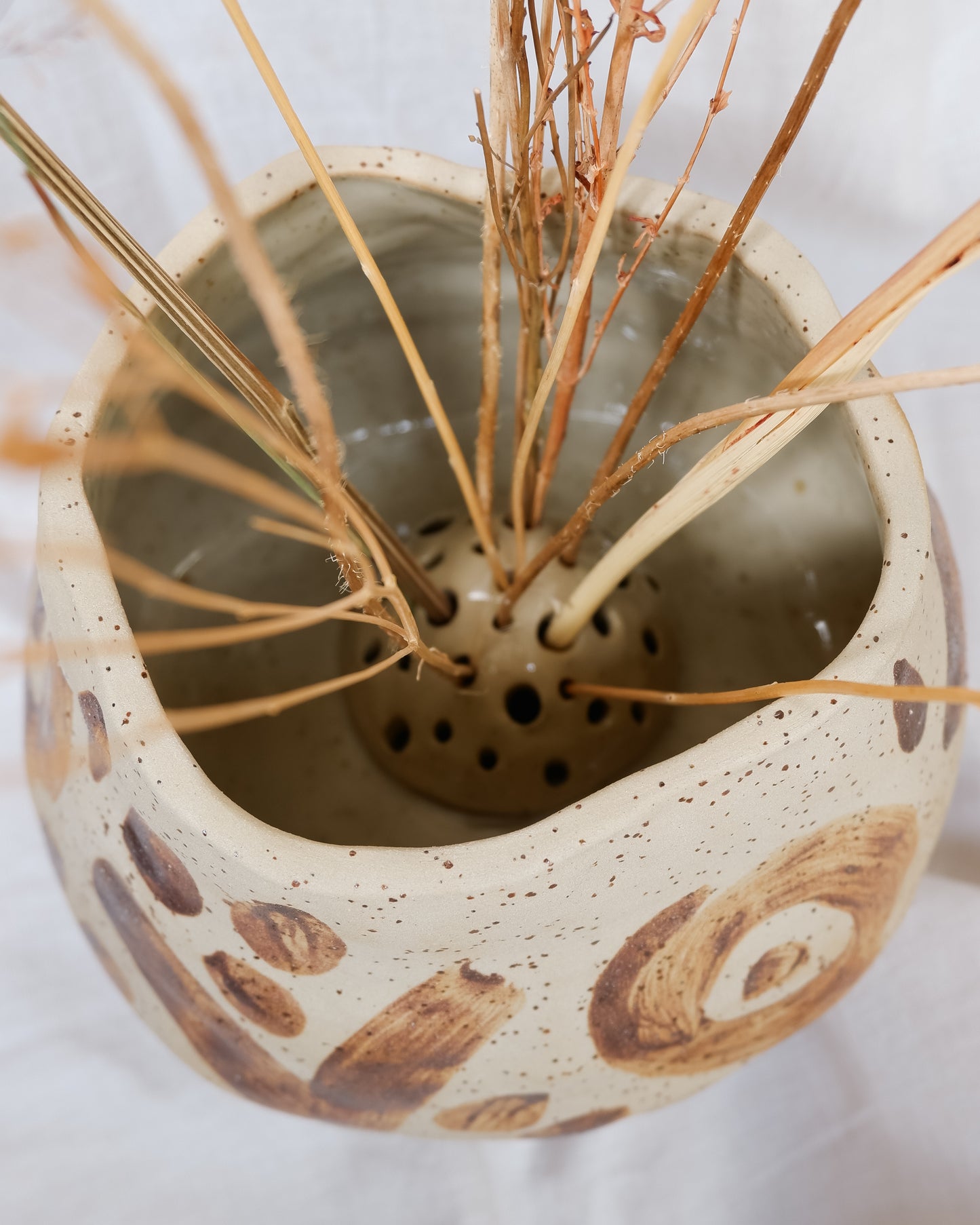 Vase decorated with wild clay