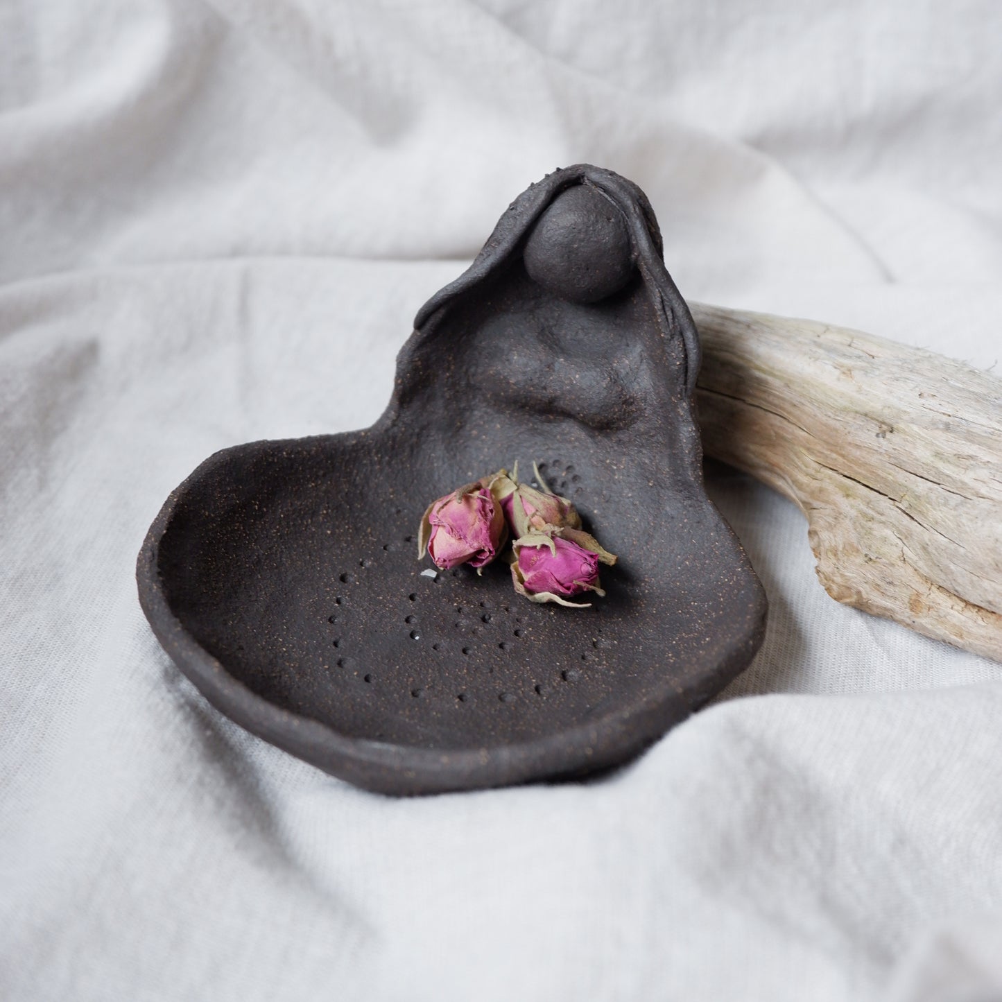 Clay Goddess sculpture