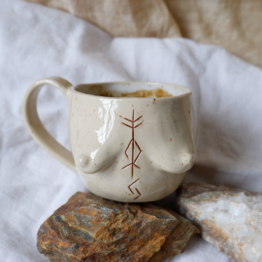 Carved tattoo mug // symbolizing abundance, heritage, and the cycles of growth and change