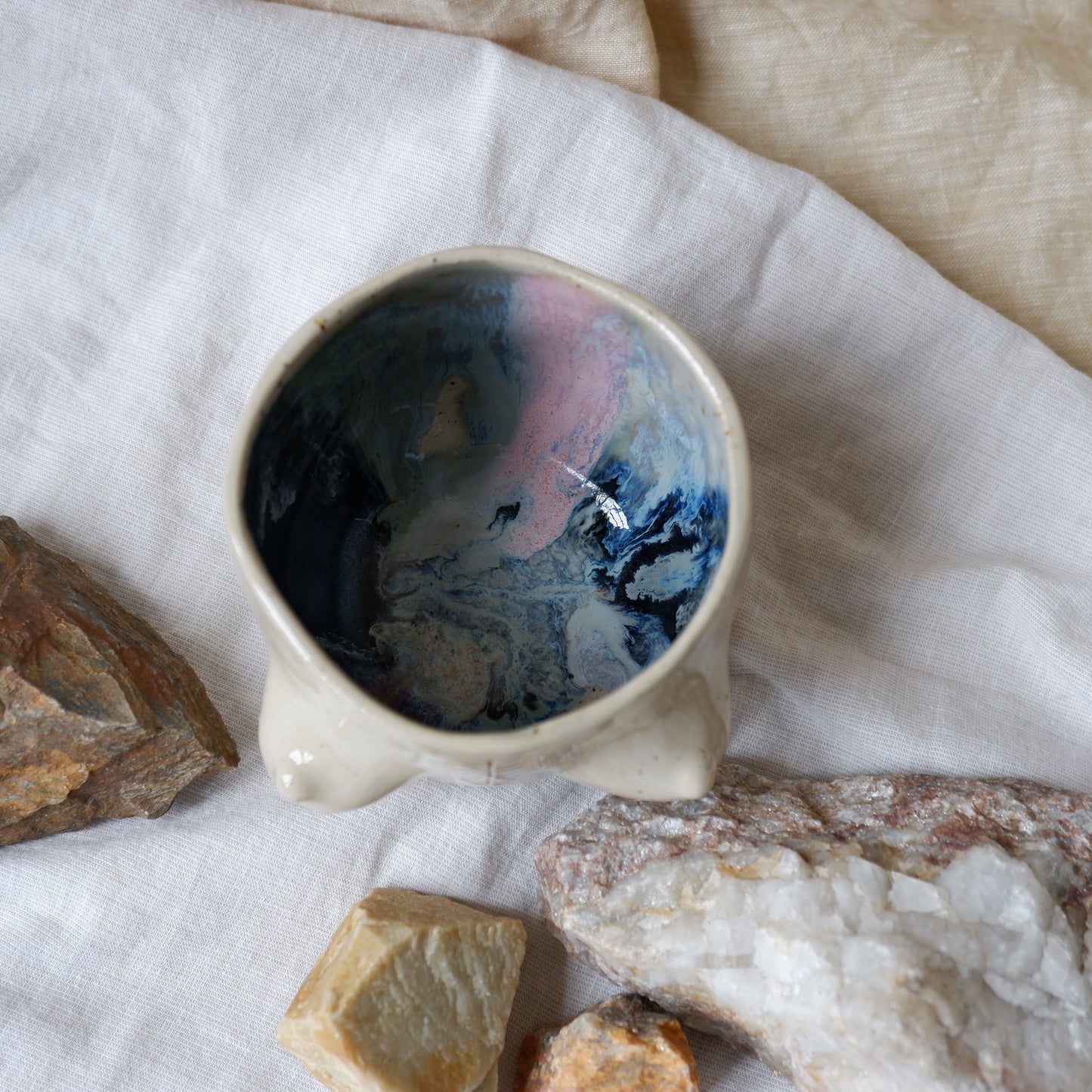 Carved tattoo mug with the sky inside