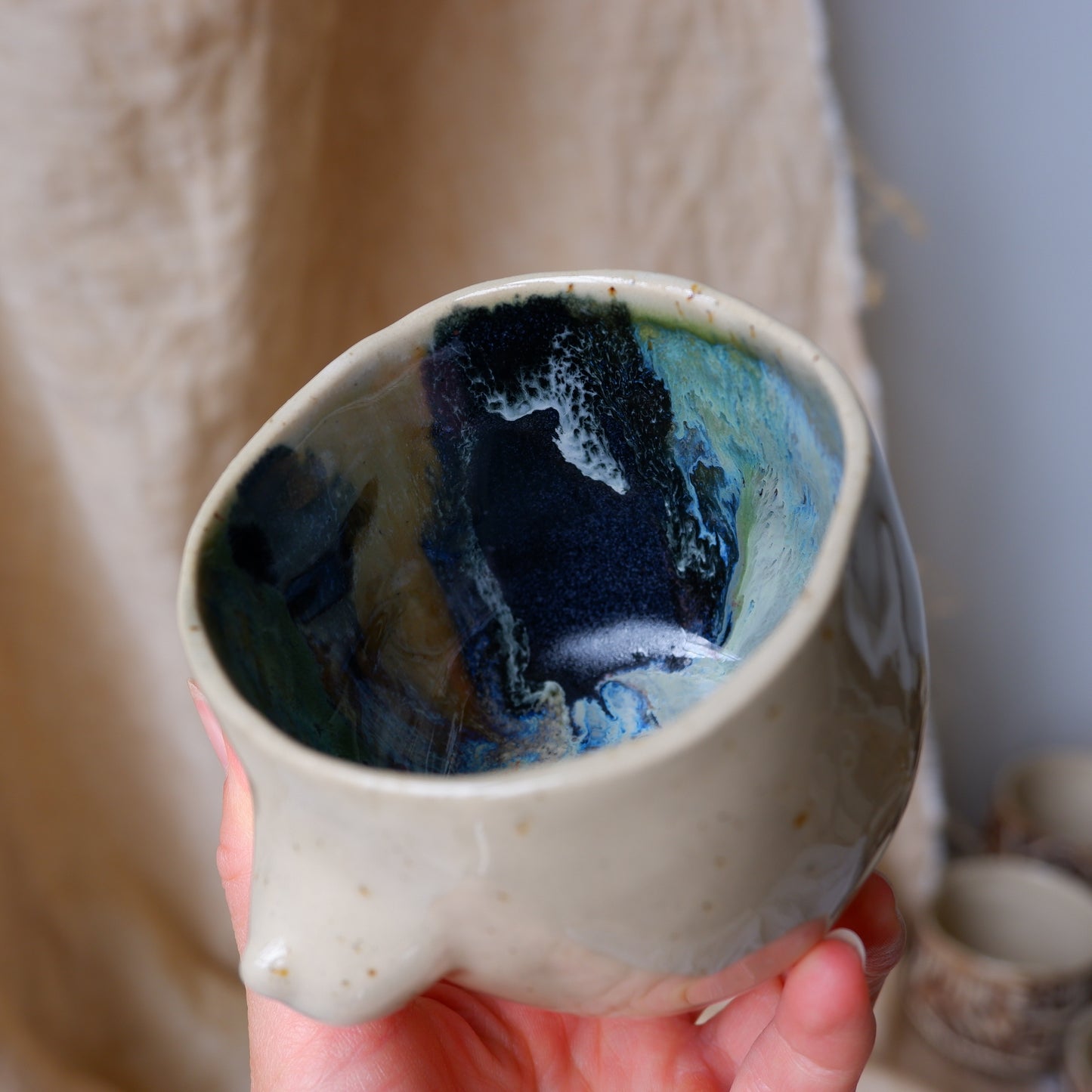 Carved tattoo mug with the sky inside