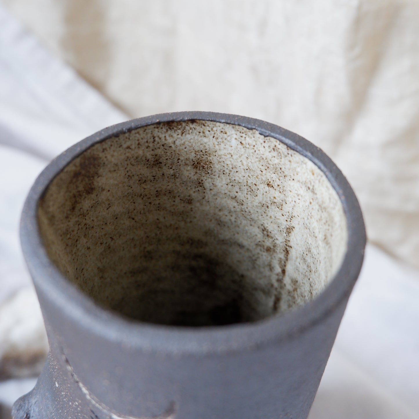Rooted Collection // Brown clay vase with piercing