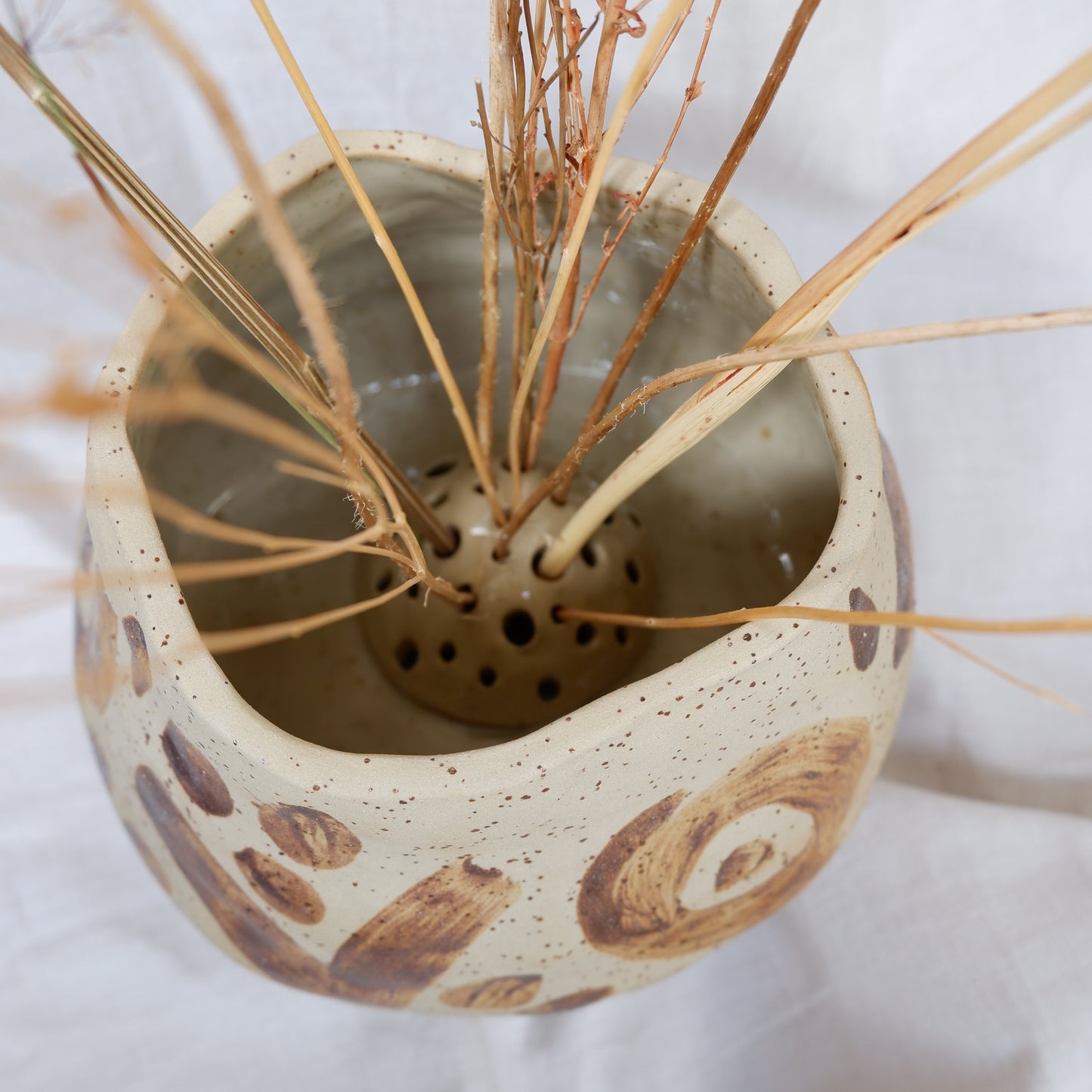 Vase decorated with wild clay