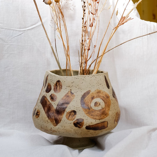 Vase decorated with wild clay