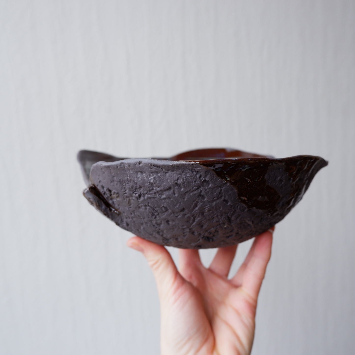 Colorful moon bowl made from black clay