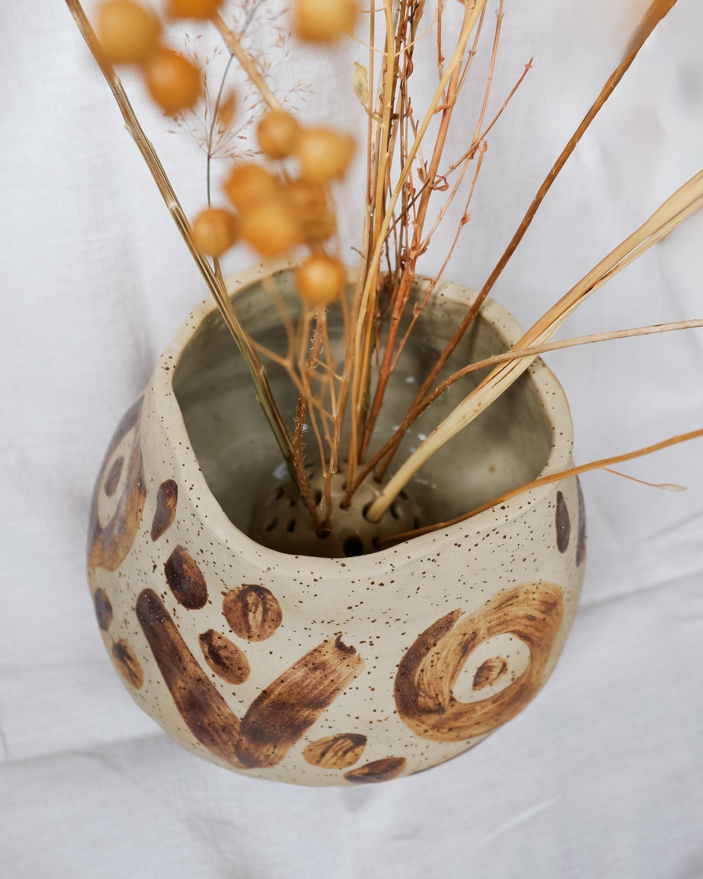 Vase decorated with wild clay