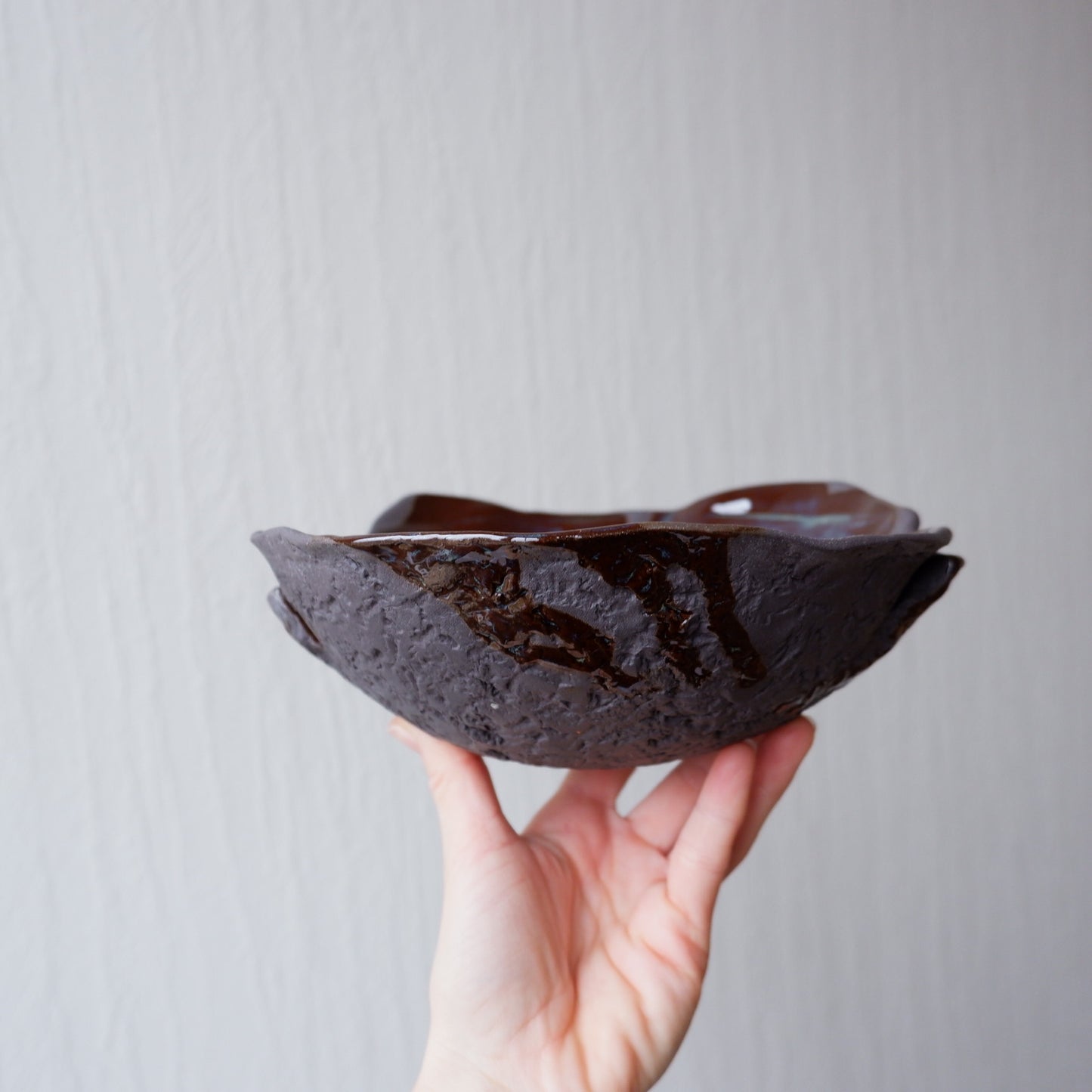 Colorful moon bowl made from black clay