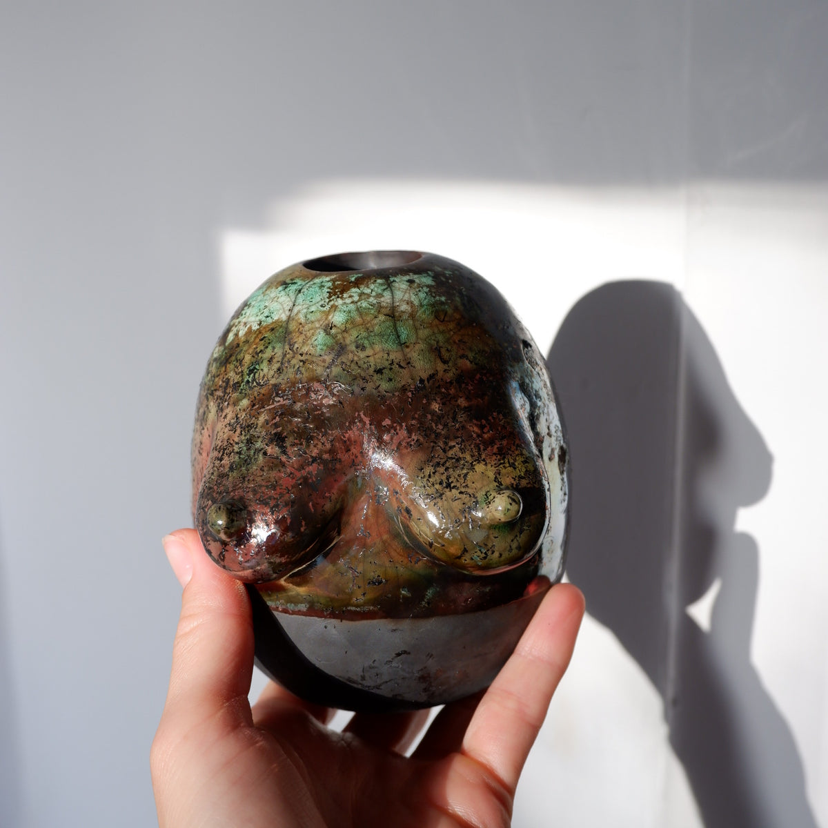 Raku fired Woman sculpture