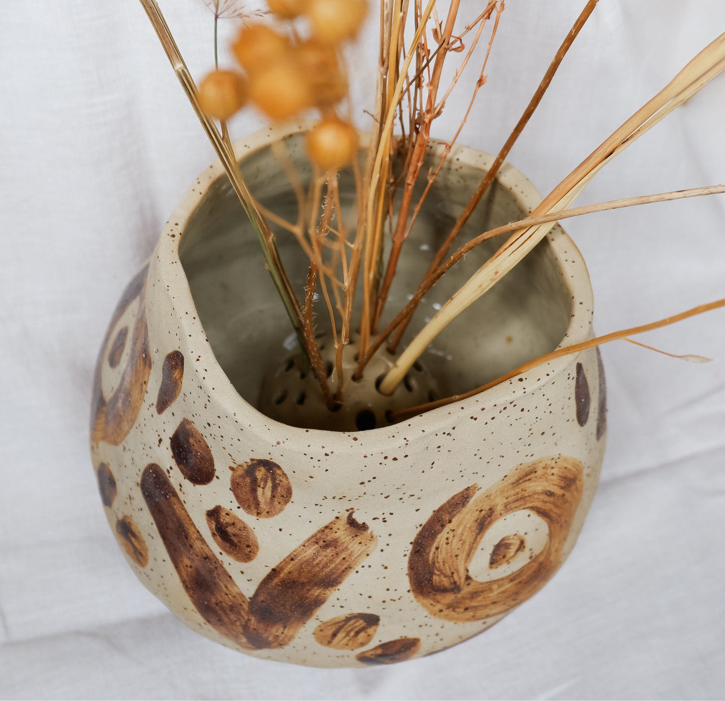 Vase decorated with wild clay