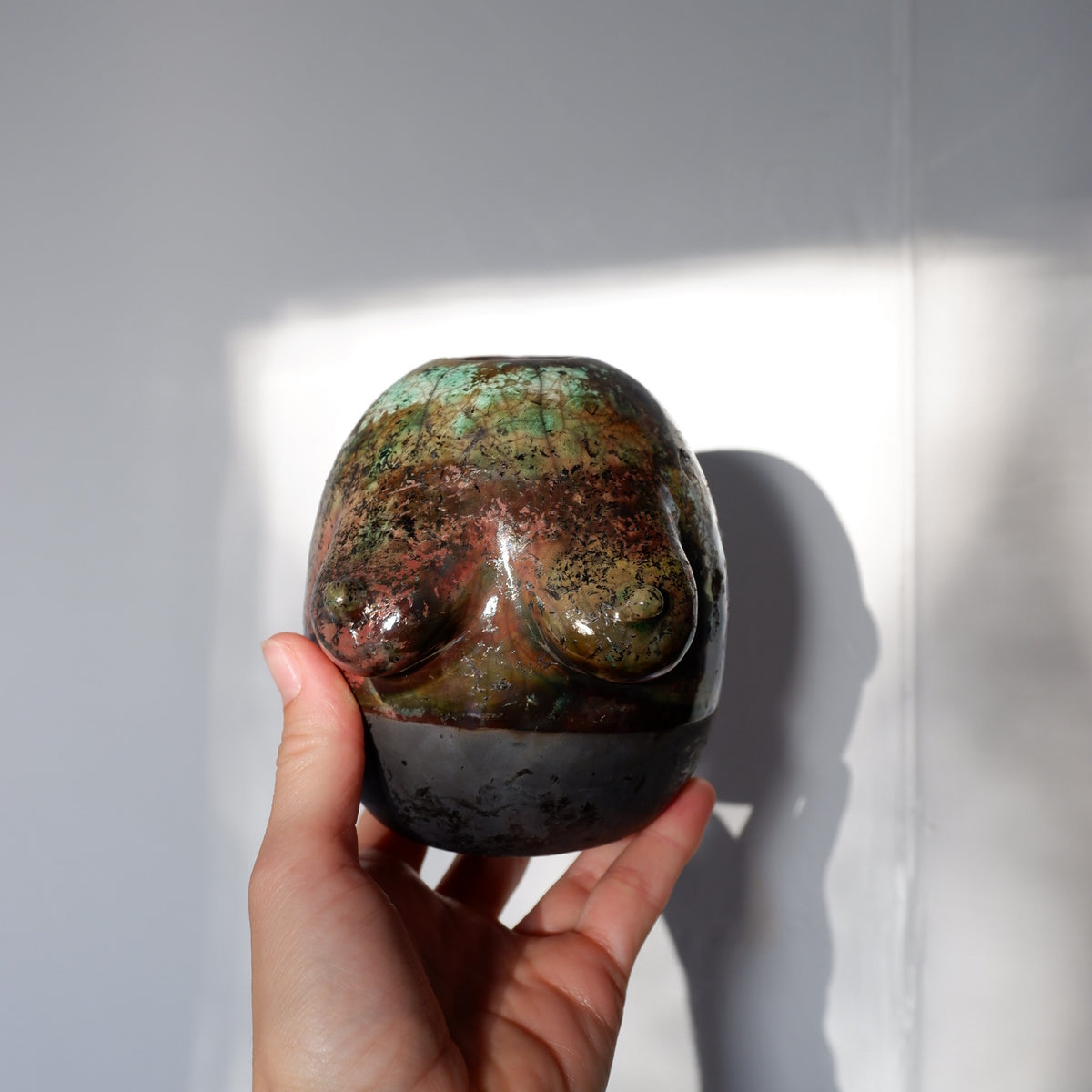 Raku fired Woman sculpture
