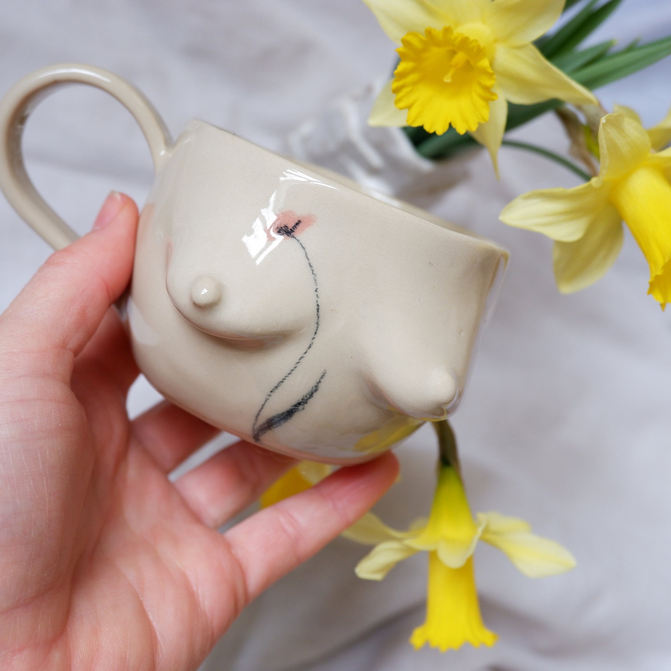 Beige mug with a handle with flower drawn by hand 🌺