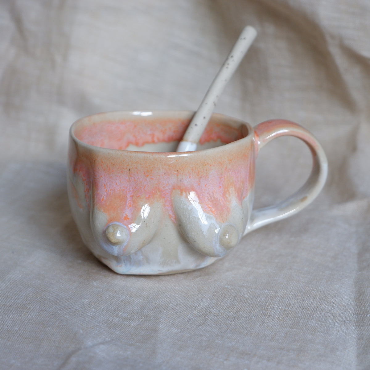 Mug & spoon set in orange and white