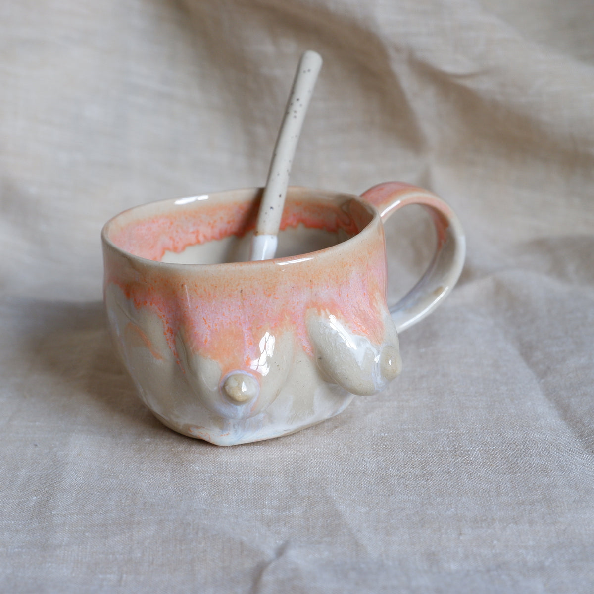 Mug & spoon set in orange and white