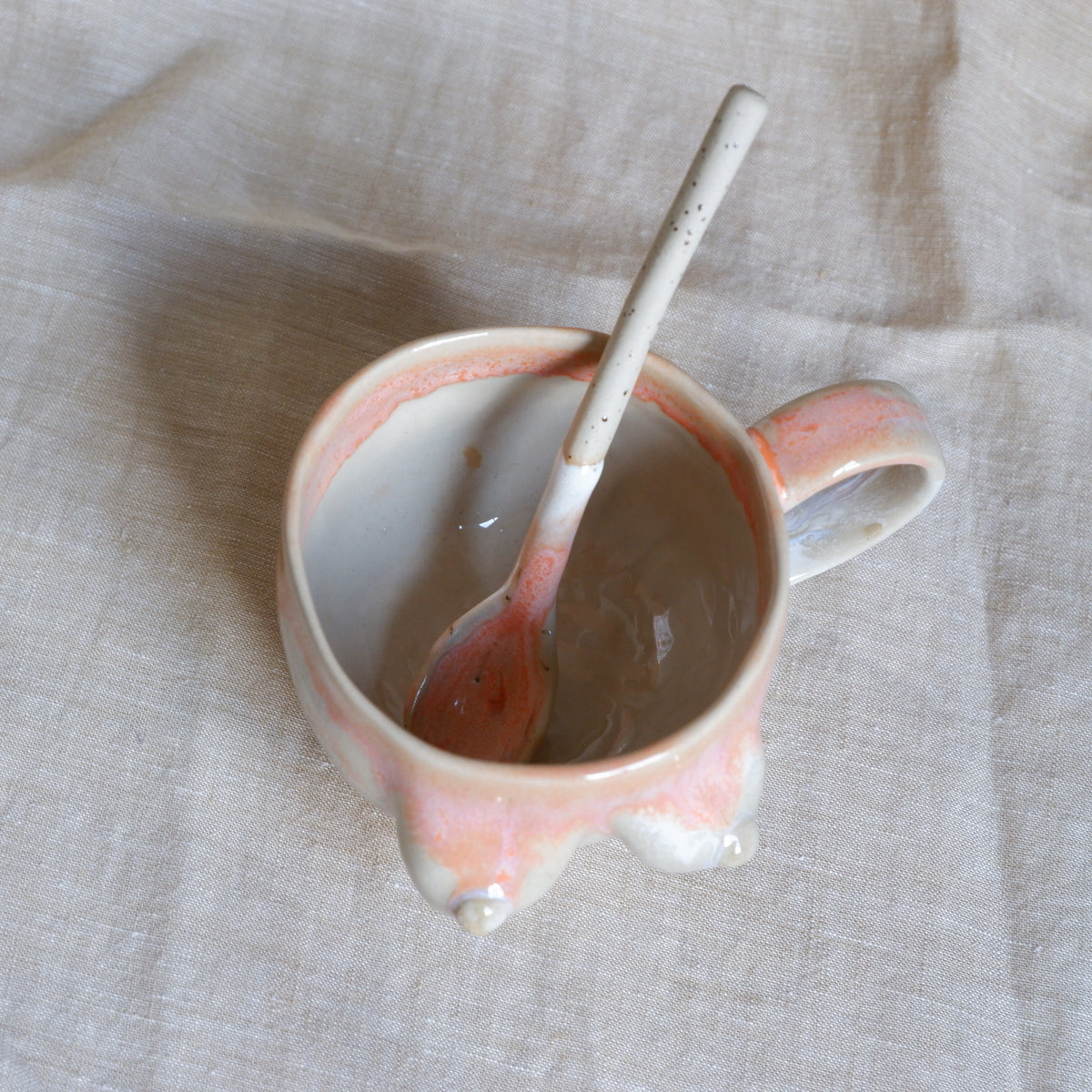 Mug & spoon set in orange and white