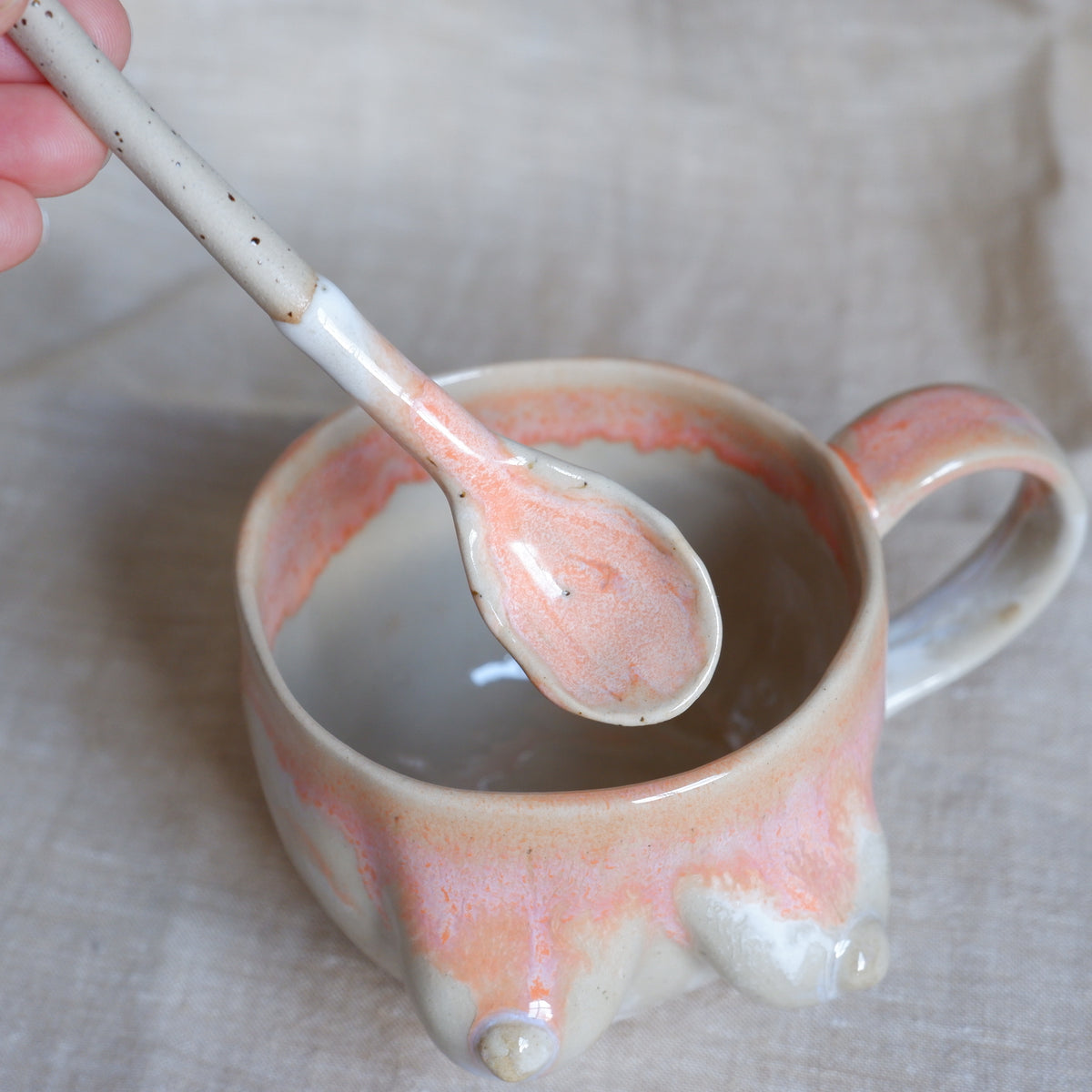 Mug & spoon set in orange and white