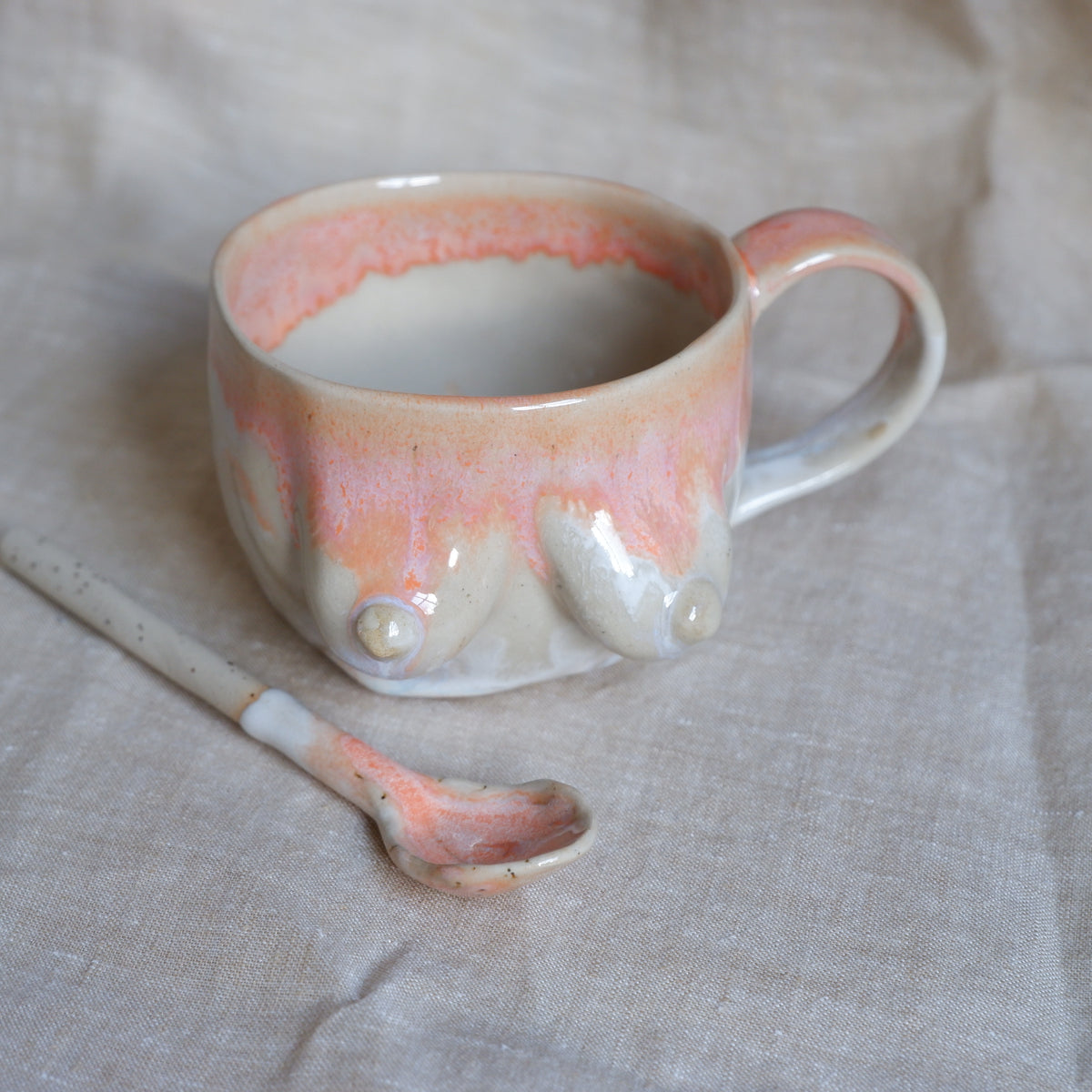 Mug & spoon set in orange and white