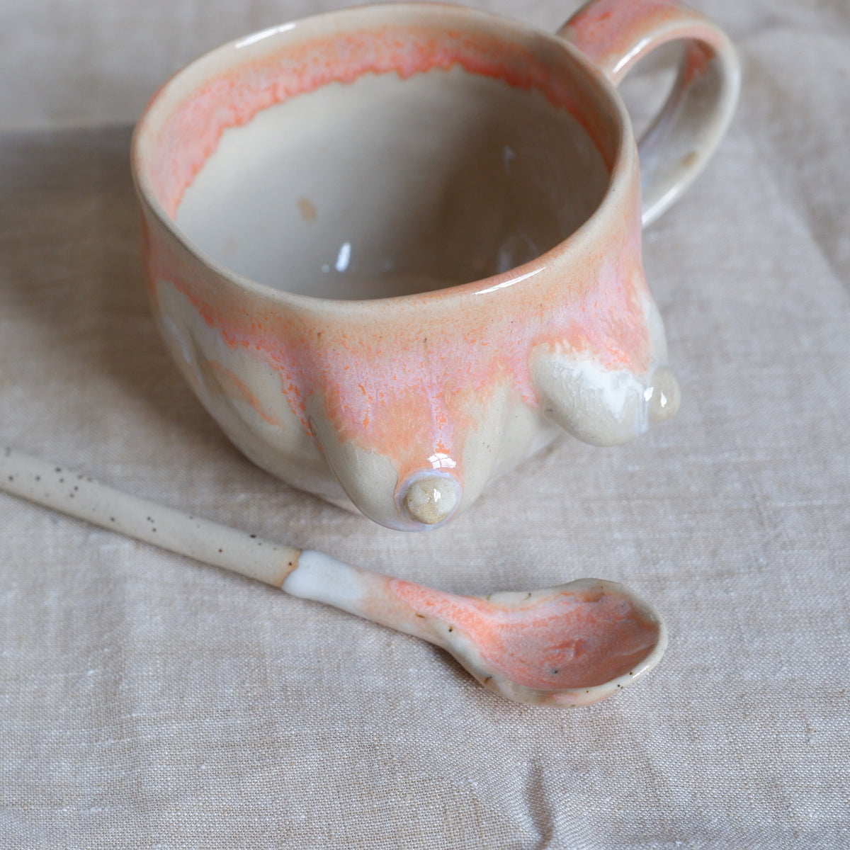 Mug & spoon set in orange and white