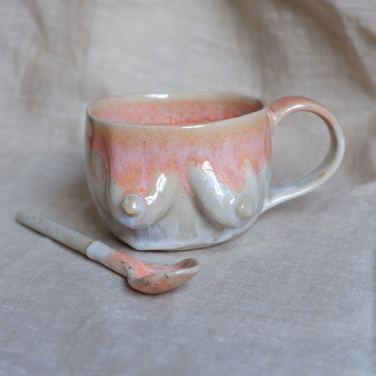 Mug & spoon set in orange and white