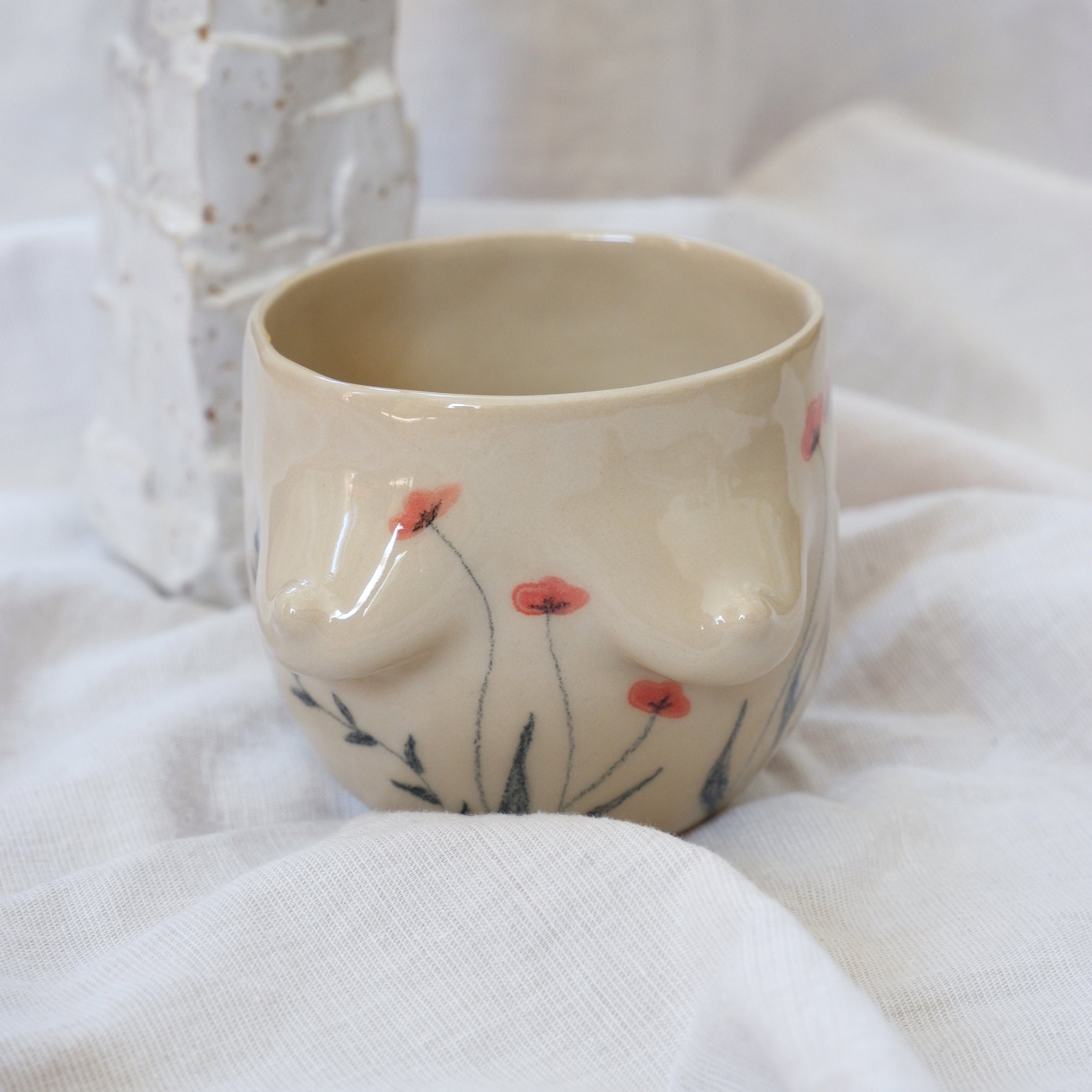Beige mug with flowers drawn by hand 🌱