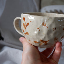 Load image into Gallery viewer, Speckled beige mug with hand-painted brown details
