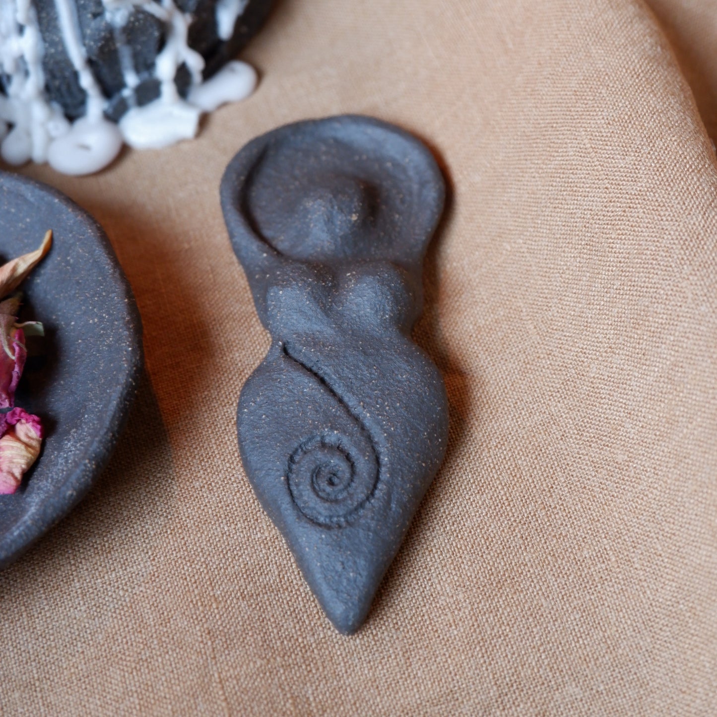 Clay Goddess sculpture