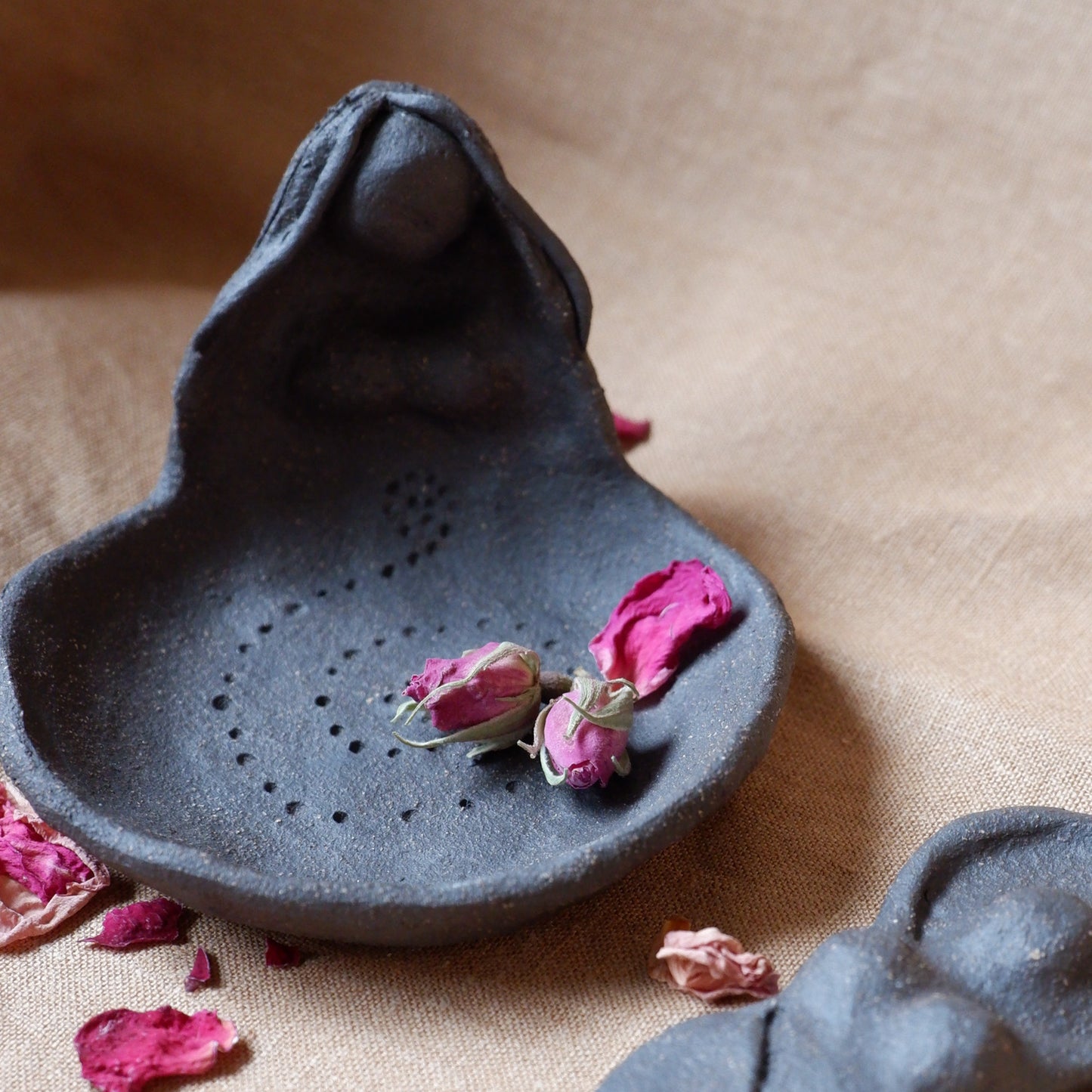 Clay Goddess sculpture