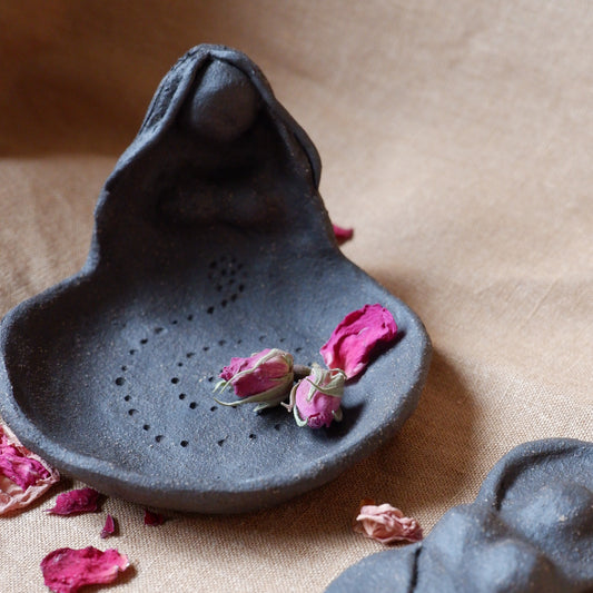 Clay Goddess sculpture