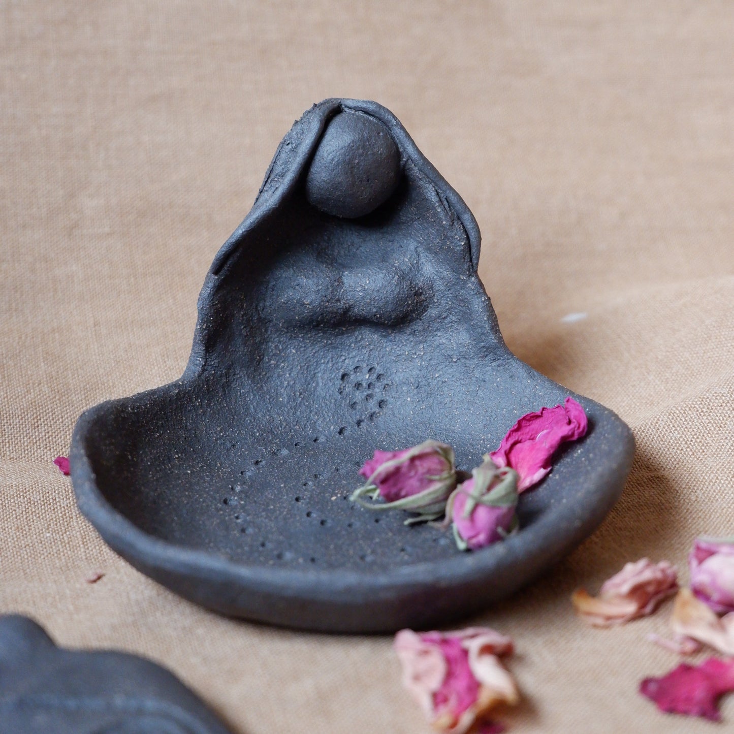 Clay Goddess sculpture