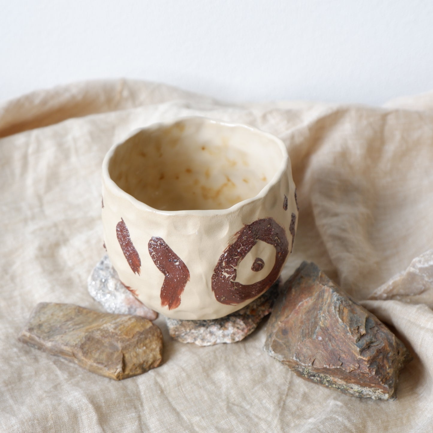 Mug decorated with wild clay