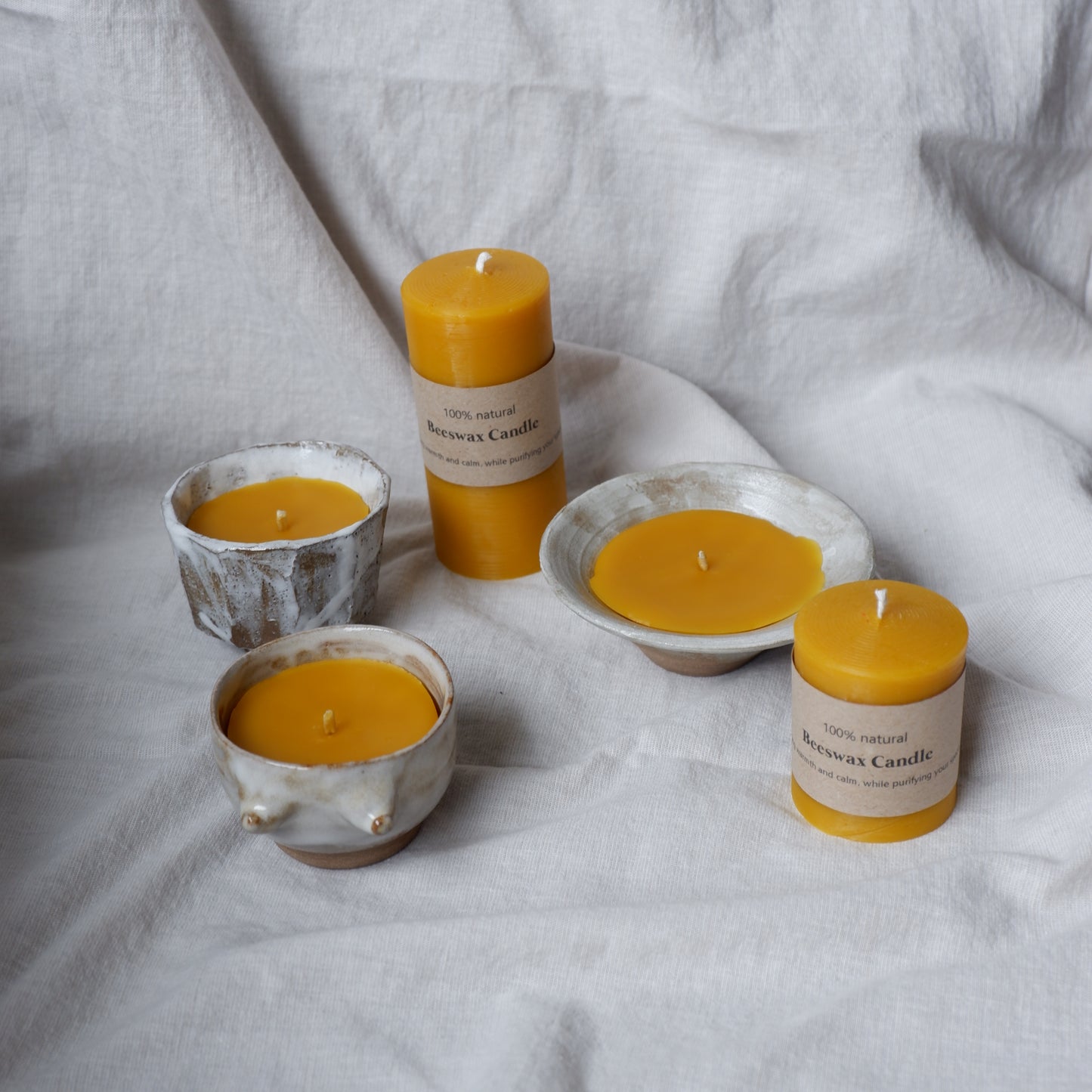 Beeswax candle in handmade ceramics no2