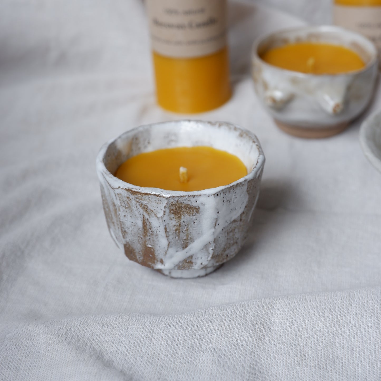 Beeswax candle in handmade ceramics no3