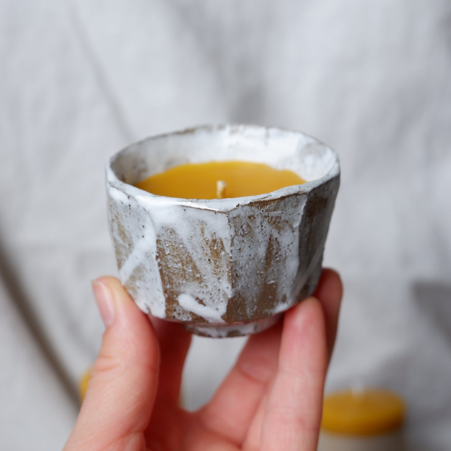 Beeswax candle in handmade ceramics no3