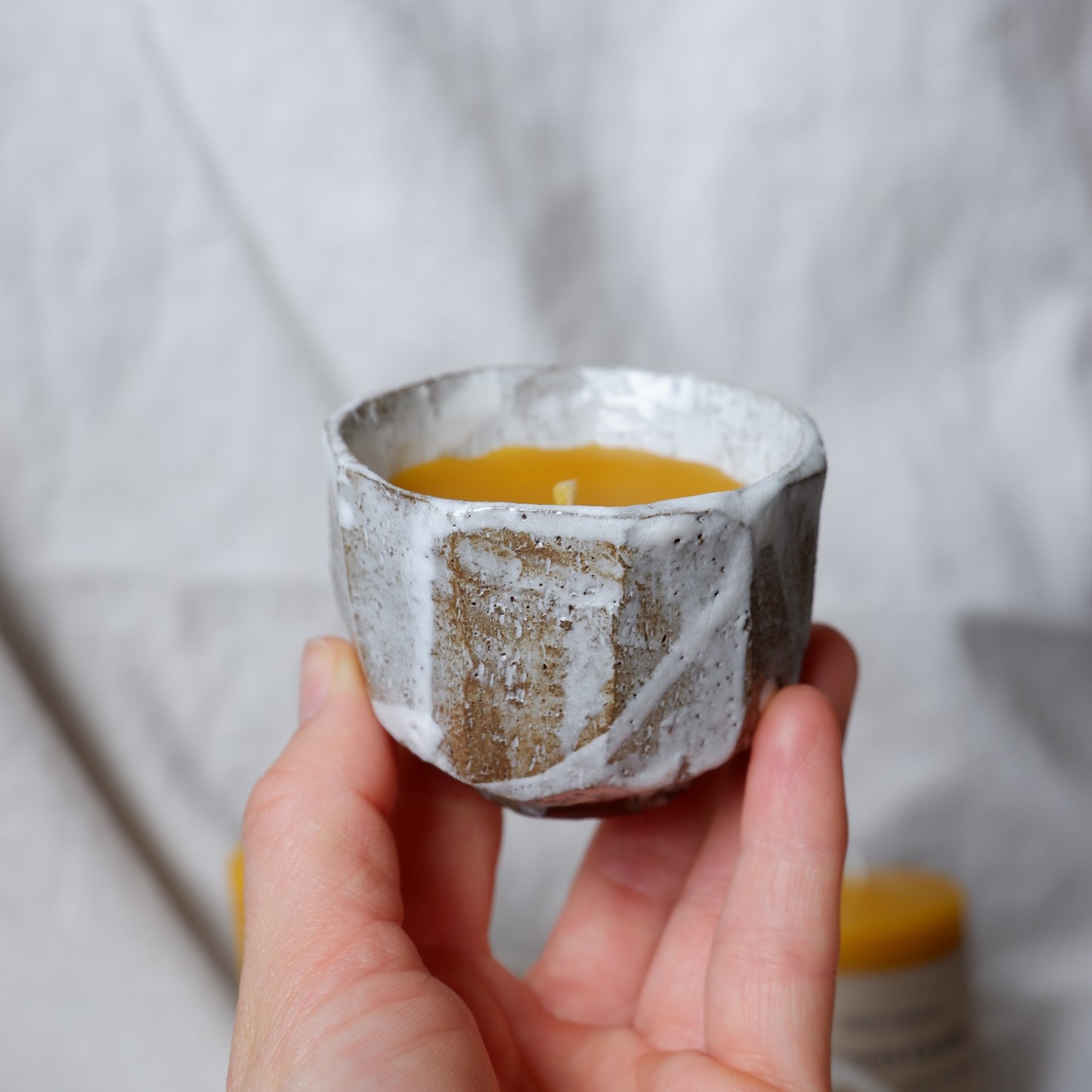 Beeswax candle in handmade ceramics no3