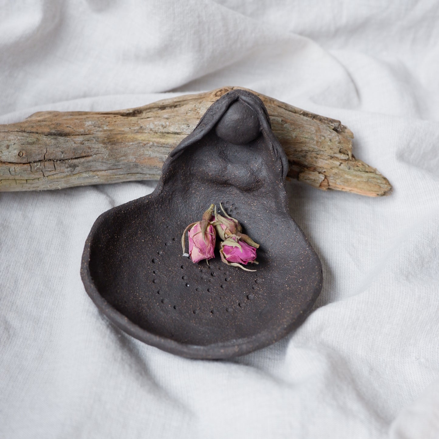 Clay Goddess sculpture