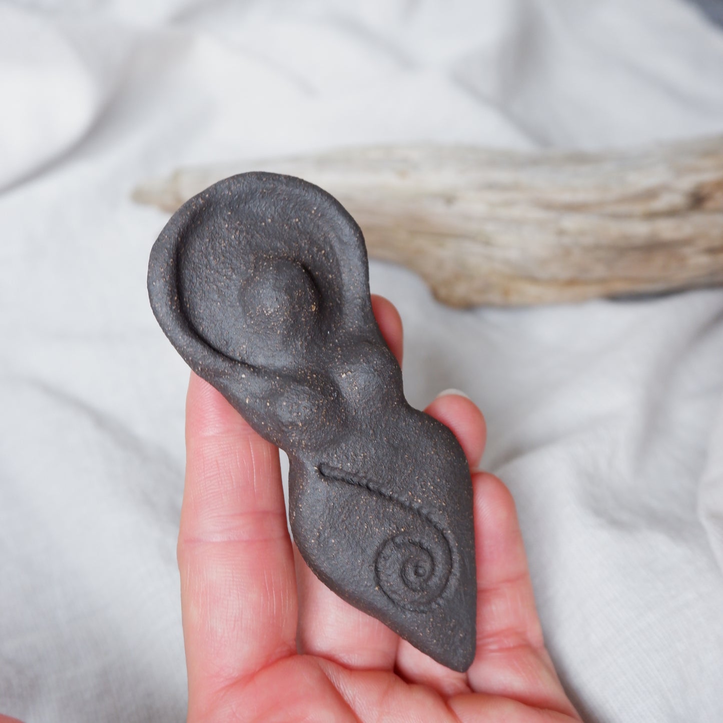 Clay Goddess sculpture