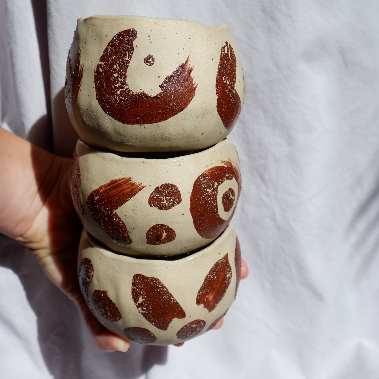 Ceremonial cups decorated with wild clay