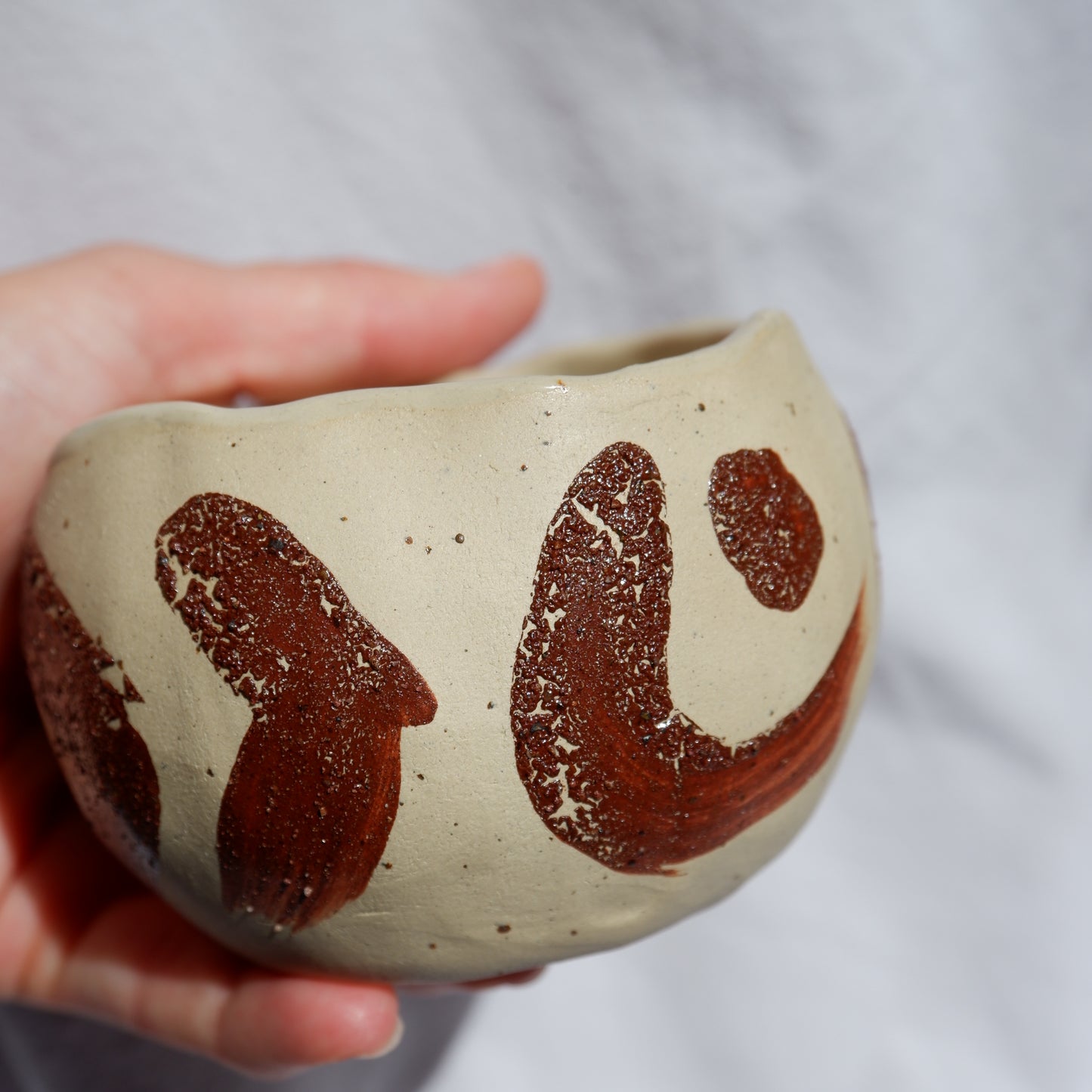 Ceremonial cups decorated with wild clay