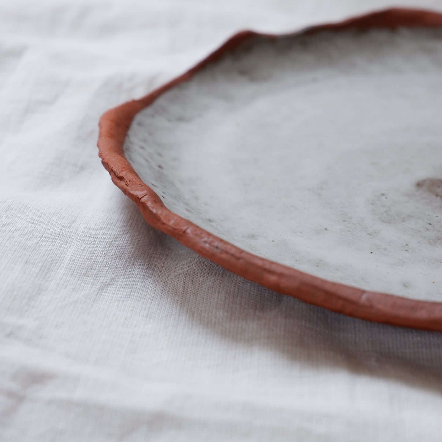 Moon plate made from red clay