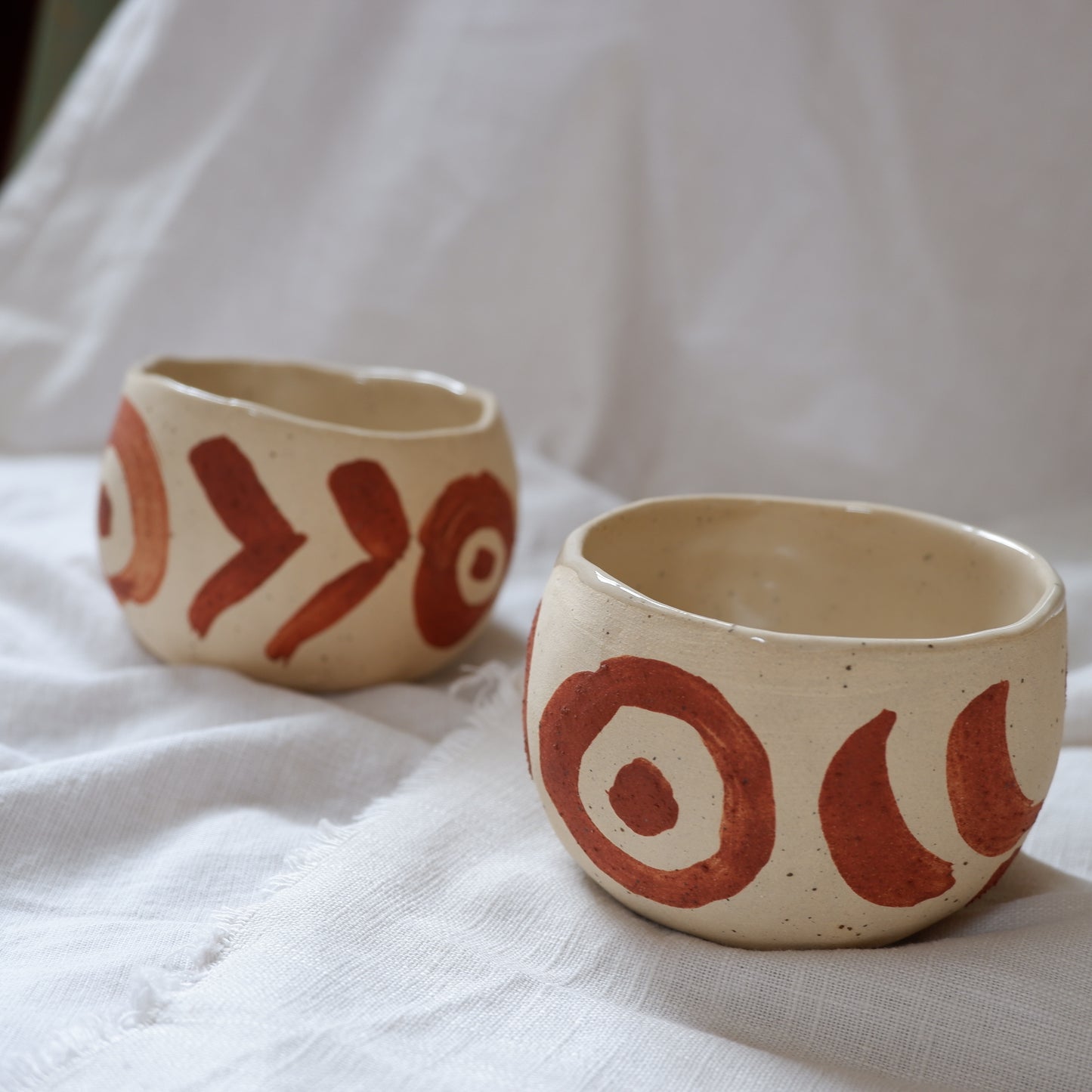 Ceremonial cups with red slip decoration