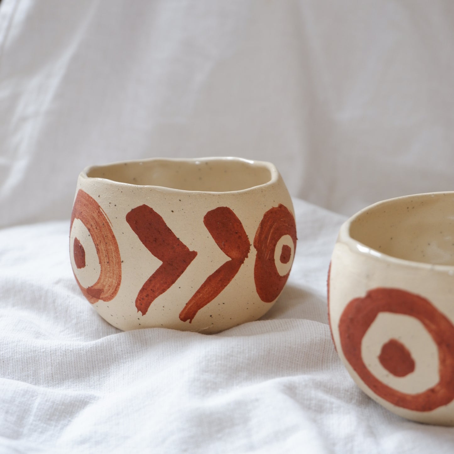 Ceremonial cups with red slip decoration