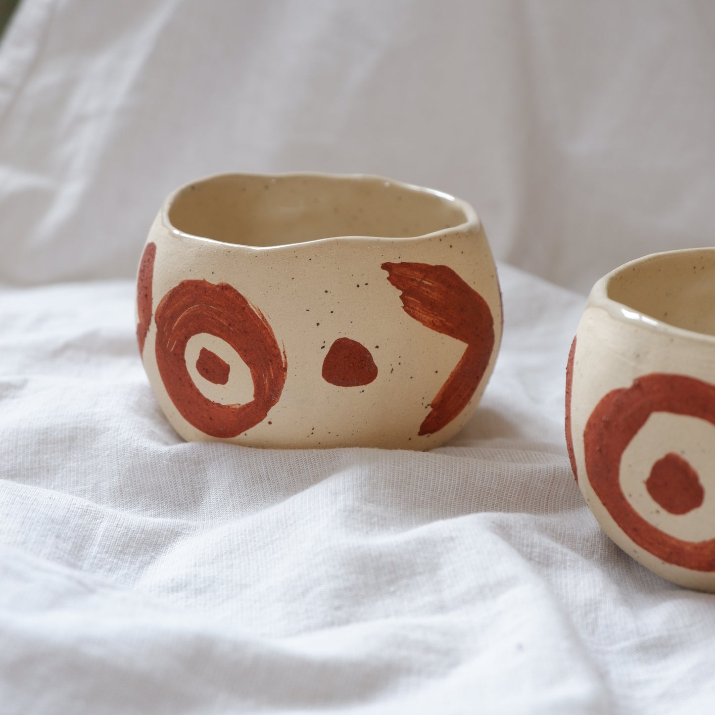 Ceremonial cups with red slip decoration