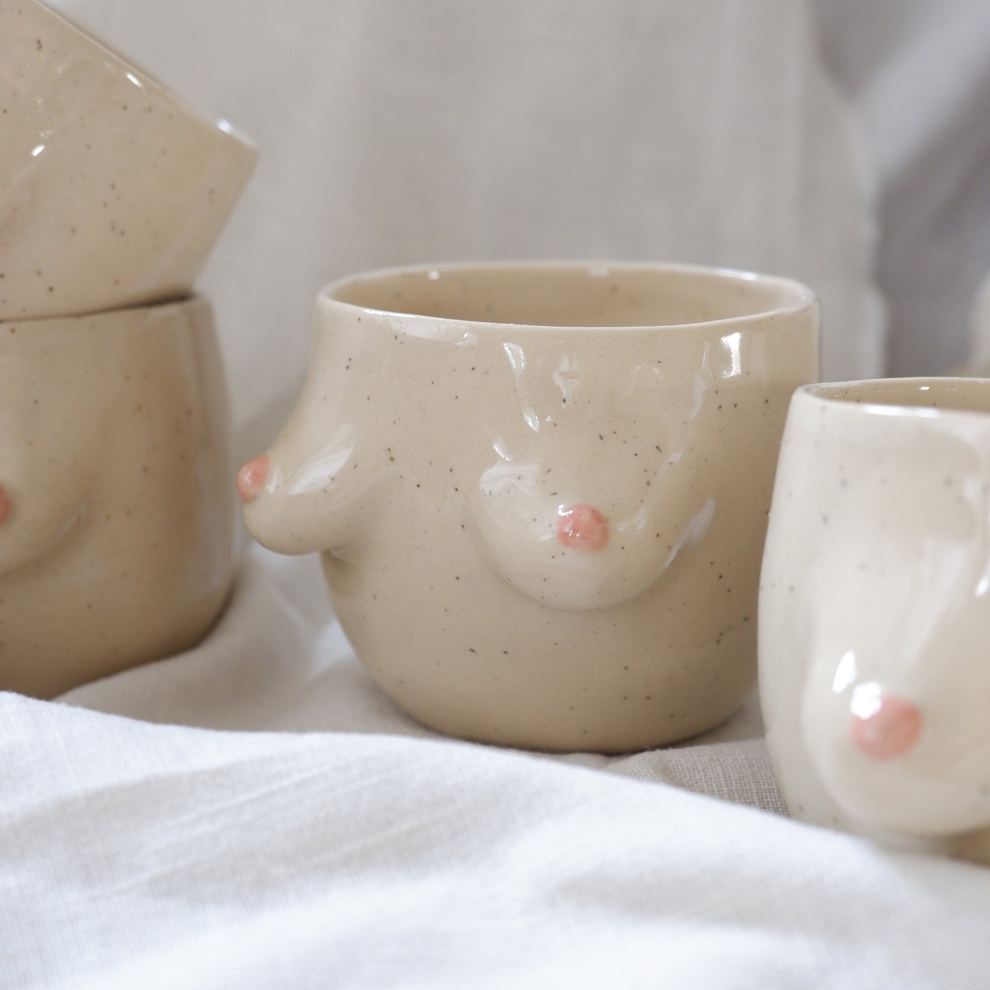 The Surprise Mug / Speckled beige mug with rose details *PREORDER*