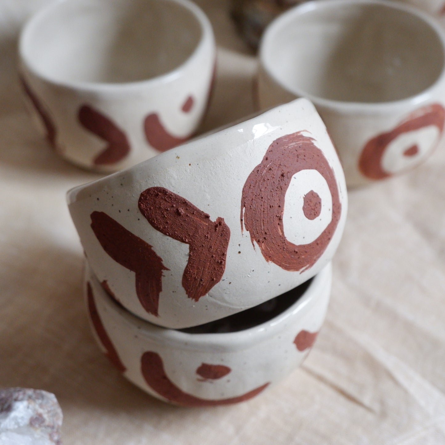 Cups with red slip decoration