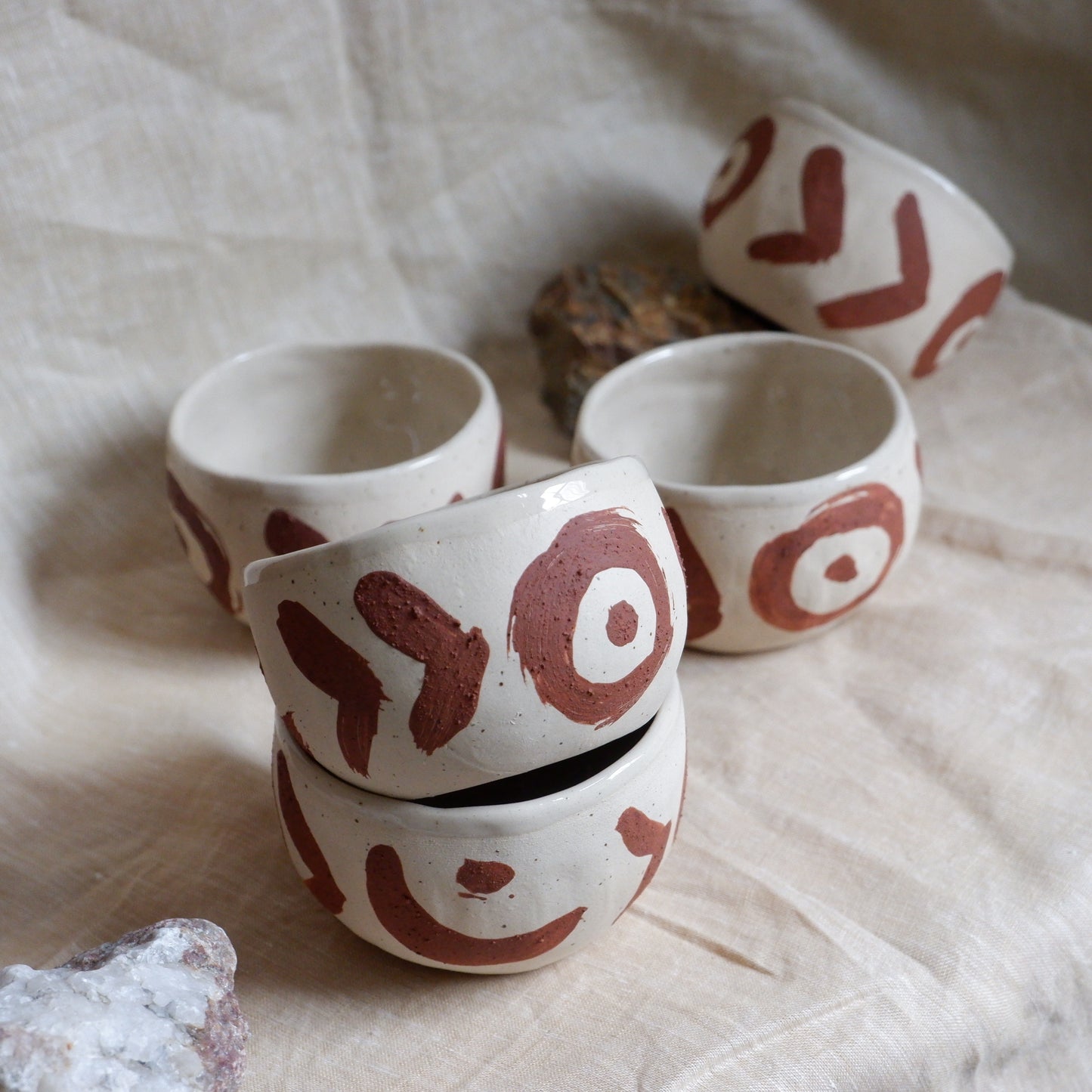Cups with red slip decoration