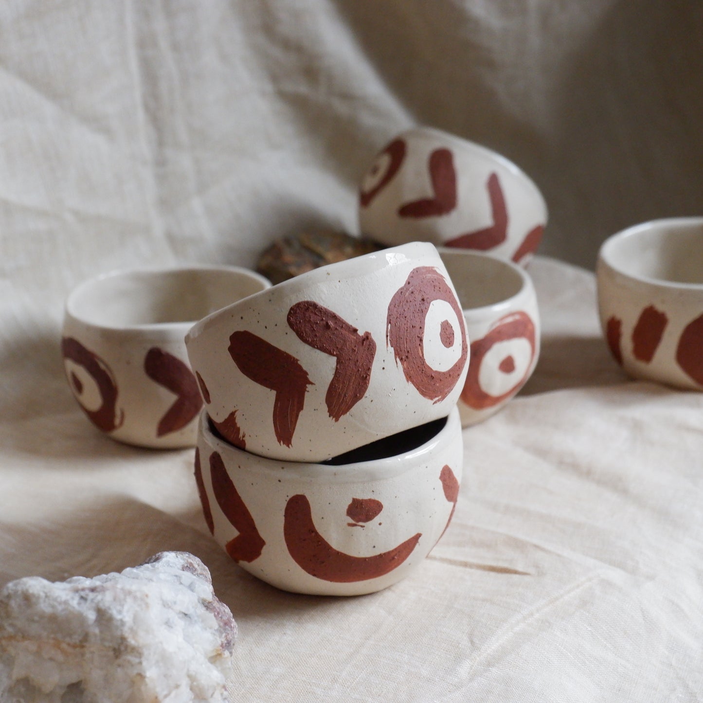 Cups with red slip decoration
