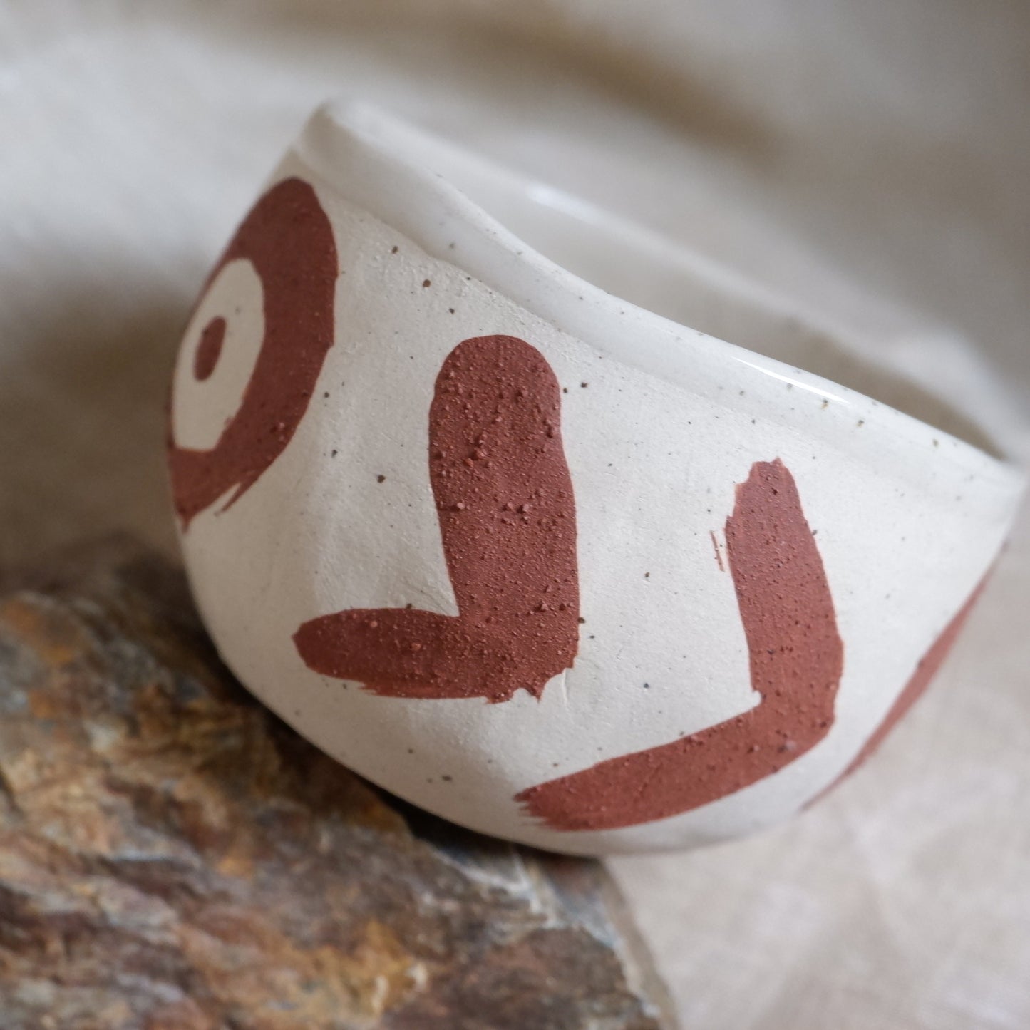 Cups with red slip decoration
