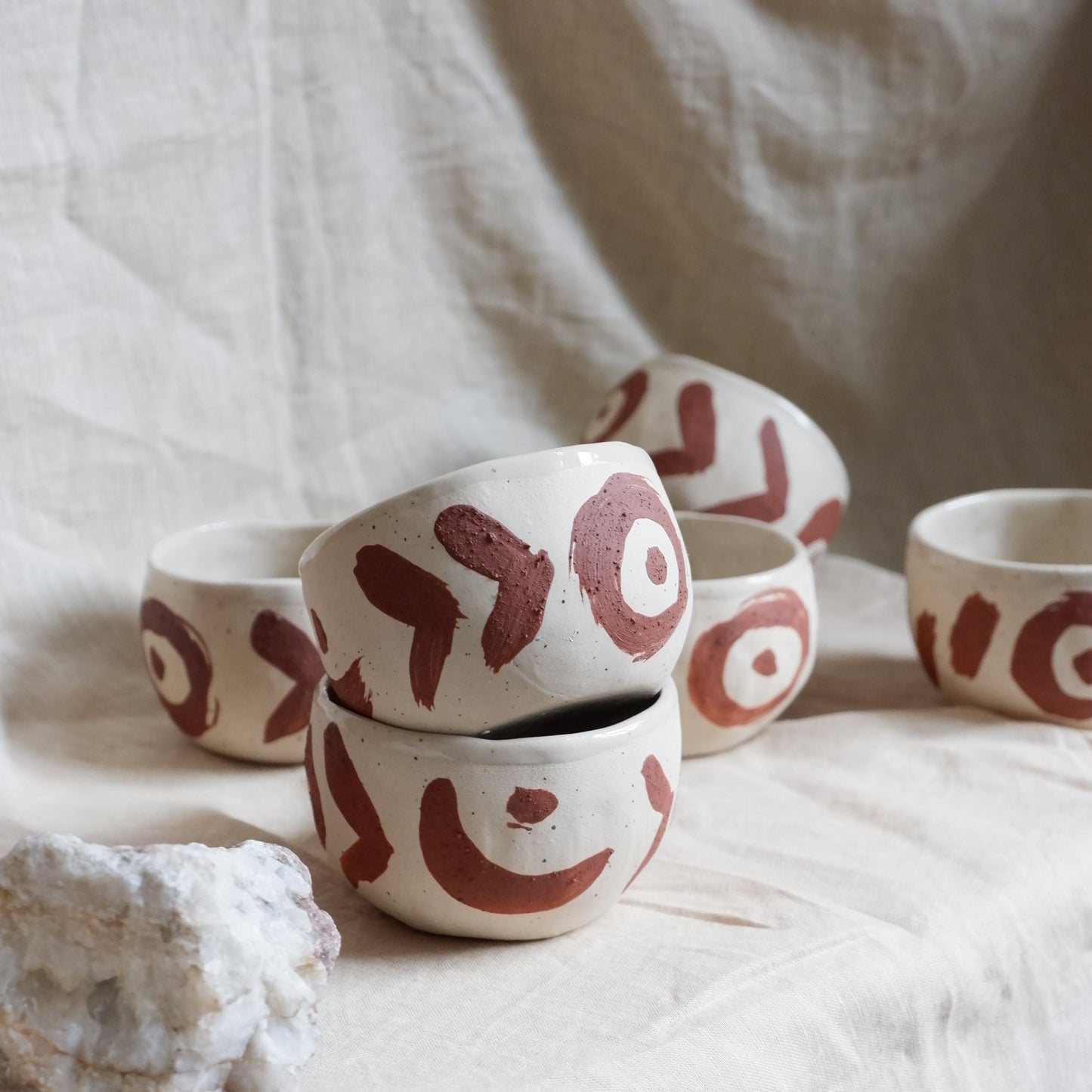Cups with red slip decoration
