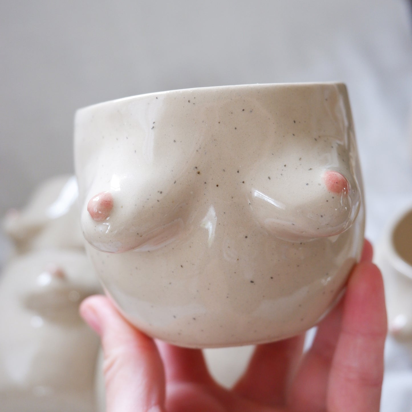 The Surprise Mug / Speckled beige mug with rose details *PREORDER*